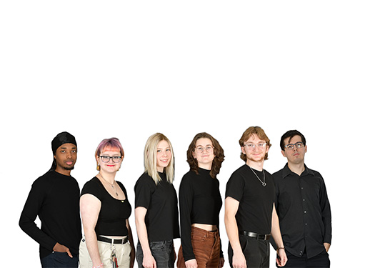 Six young adults standing in a row against a white background, all wearing casual black tops.